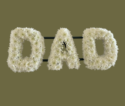 DAD Flower Tribute - "DAD" flower tribute provides a touching way to celebrate a life well loved and a love that will always remain.