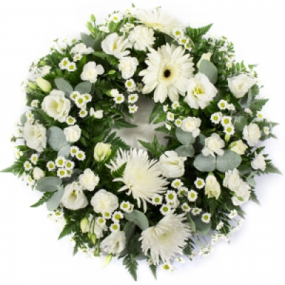 Loose Ring Wreath (Light) - Mixed flowers suitable for a lady or a gentleman. Ring wreath for a funeral in creams.  12" $100 / 14" $120 / 16" $145 Important! This type of funeral arrangement needs 1 working day prior notice to delivery. It is not possible to make and deliver an item like this same day. 