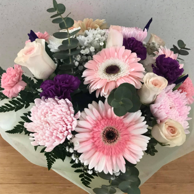 Sweet Escape - A lovely handtied in water presented in a gif bag/box. Created using pale pink and purple flowers complimentary foliage. Hand delivered with care in and around Perth by Carramar Flowers & Gifts.