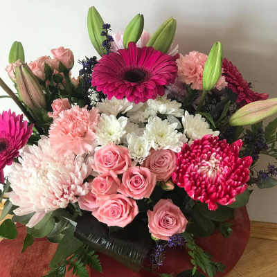 Pink Delight - A delightful handtied in water presented in a gif bag/box. Created using pink and white flowers with complimentary foliage. Hand delivered with care in and around Perth by Carramar Flowers & Gifts.